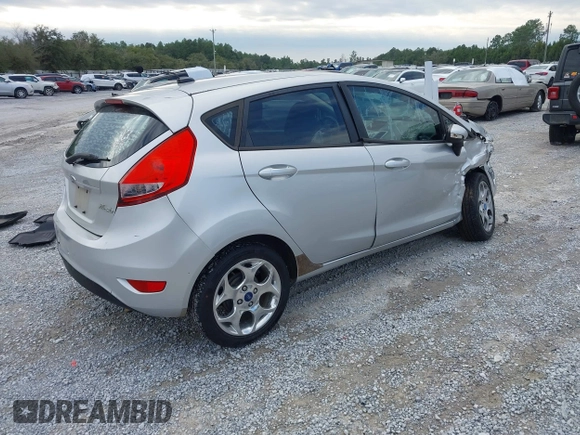 2011 Ford Fiesta SES with VIN 3FADP4FJ5BM232264, listed as a IAAI auction lot 40982622 with 184,726 mi miles. Bid and sale history available at carsss.com. Image 4.