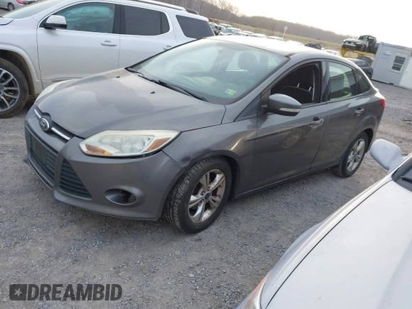 2013 Ford Focus SE with VIN 1FADP3F23DL242069, listed as a IAAI auction lot 41781817 with 265,630 mi miles. Bid and sale history available at carsss.com. Image 2.