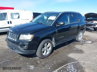 2014 Jeep Compass Sport with VIN 1C4NJCBB1ED587005, listed as a IAAI auction lot 41706302 with 184,419 mi miles. Bid and sale history available at carsss.com. Image 18.