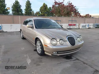 2001 Jaguar S-Type V8 with VIN SAJDA01D21GL81943, listed as a IAAI auction lot 40988369 with 104,777 mi miles and . Bid and sale history available at DreamBid. Image 1.