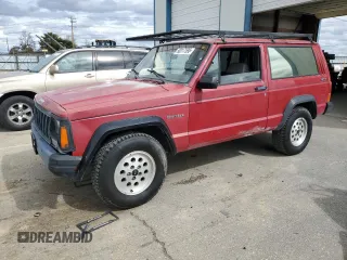1992 Jeep Cherokee z VIN 1J4FJ87S3NL129945, wystawiony jako Copart lot #50317595 z przebiegiem 201 269 mil mil oraz Czysty tytuł • Clean title. Historia ofert i sprzedaży dostępna na DreamBid. Obrazek 1.