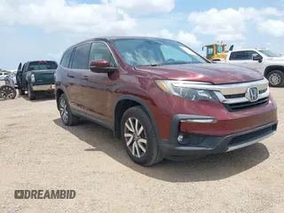 2019 Honda Pilot EX-L z VIN 5FNYF6H55KB083207, wystawiony jako IAAI lot #42439596 z przebiegiem 70 741 mil mil oraz . Historia ofert i sprzedaży dostępna na DreamBid. Obrazek 1.