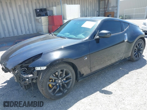 2019 Nissan 370Z Sport Touring with VIN JN1AZ4EH1KM420719, listed as a IAAI auction lot 42096816 with 97,803 mi miles and . Bid and sale history available at DreamBid. Image 18.
