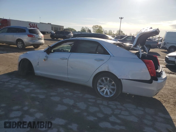 2015 Cadillac CTS RWD with VIN 1G6AP5SXXF0136820, listed as a Copart auction lot 54666385 with 129,763 mi miles and Clean title. Bid and sale history available at DreamBid. Image 2.