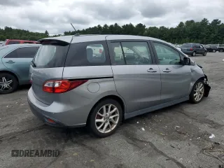 2014 Mazda 5 Touring with VIN JM1CW2CL6E0174143, listed as a Copart auction lot 68129294 with 105,764 mi miles and Salvage Title. Bid and sale history available at carsss.com. Image 3.