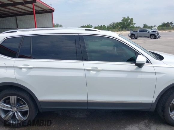 2020 Volkswagen Tiguan SE z VIN 3VV3B7AX4LM032609, wystawiony jako IAAI lot #42074359 z przebiegiem 52 404 mil mil oraz . Historia ofert i sprzedaży dostępna na DreamBid. Obrazek 13.
