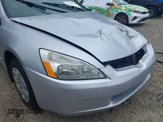 2003 Honda Accord LX z VIN 1HGCM56363A140358, wystawiony jako IAAI lot #42365056 z przebiegiem 202 238 mil mil oraz . Historia ofert i sprzedaży dostępna na DreamBid. Obrazek 17.