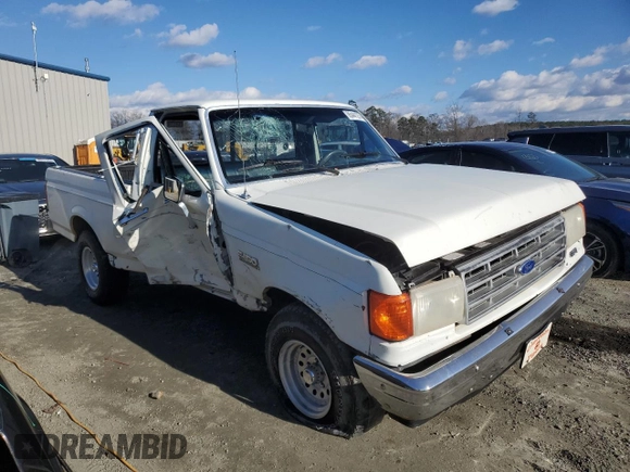 1987 Ford F-150 with VIN 1FTCF15Y7HNA56371, listed as a Copart auction lot 85441274 with 76,200 mi miles and Salvage Title. Bid and sale history available at carsss.com. Image 4.