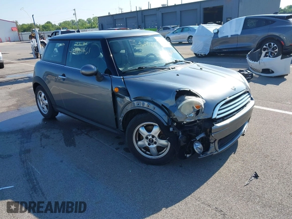2010 MINI Hardtop with VIN WMWMF3C51ATZ61146, listed as a IAAI auction lot 42611461 with 96,038 mi miles and . Bid and sale history available at DreamBid. Image 1.