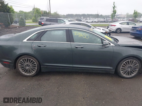 2015 Lincoln MKZ Hybrid z VIN 3LN6L2LU7FR618867, wystawiony jako IAAI lot #42291650 z przebiegiem 109 021 mil mil oraz . Historia ofert i sprzedaży dostępna na DreamBid. Obrazek 13.