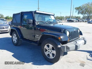 2012 Jeep Wrangler Arctic z VIN 1C4AJWBG7CL170079, wystawiony jako IAAI lot #41004260 z przebiegiem 83 408 mil mil oraz . Historia ofert i sprzedaży dostępna na DreamBid. Obrazek 1.