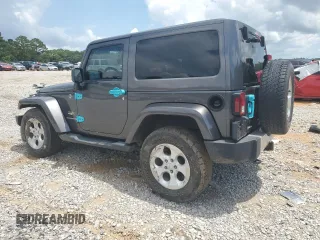 2014 Jeep Wrangler Sahara with VIN 1C4AJWBG8EL248291, listed as a Copart auction lot 60611345 with 84,777 mi miles and Salvage title. Bid and sale history available at DreamBid. Image 2.