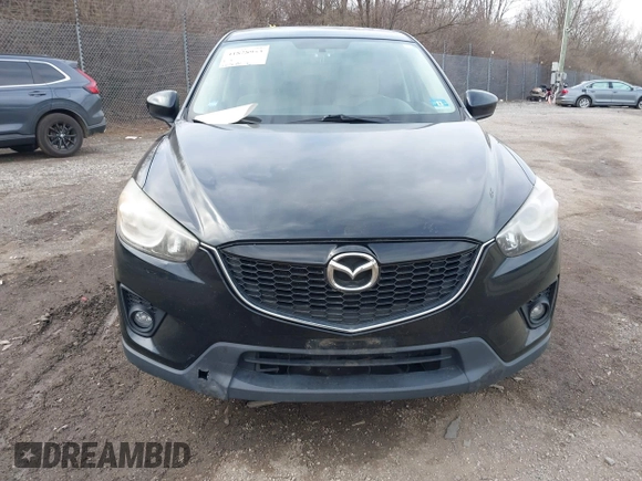 2015 Mazda CX-5 Touring with VIN JM3KE4CY2F0445178, listed as a IAAI auction lot 41828953 with 137,330 mi miles and . Bid and sale history available at DreamBid. Image 13.