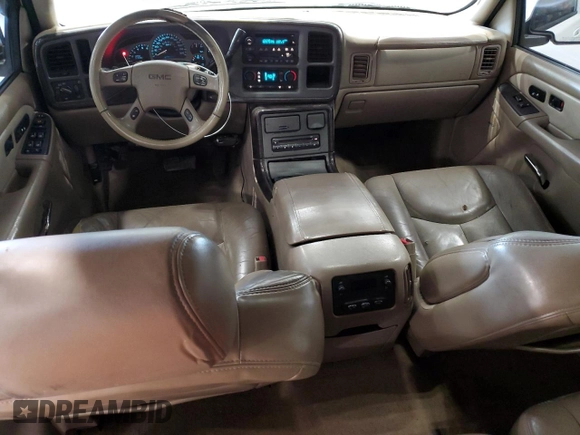 2005 GMC Sierra Denali z VIN 2GTEK63N851345265, wystawiony jako Copart lot #54933125 z przebiegiem 276 871 mil mil oraz Nie do naprawy. Historia ofert i sprzedaży dostępna na DreamBid. Obrazek 8.