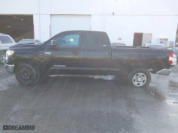 2014 Toyota Tundra 4WD Truck SR with VIN 5TFUW5F1XEX377799, listed as a IAAI auction lot 41889381 with 225,551 mi miles. Bid and sale history available at carsss.com. Image 14.