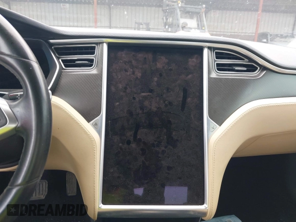 2014 Tesla Model S 60 z VIN 5YJSA1H19EFP51406, wystawiony jako IAAI lot #42179183 z przebiegiem 157 000 mil mil oraz . Historia ofert i sprzedaży dostępna na DreamBid. Obrazek 18.