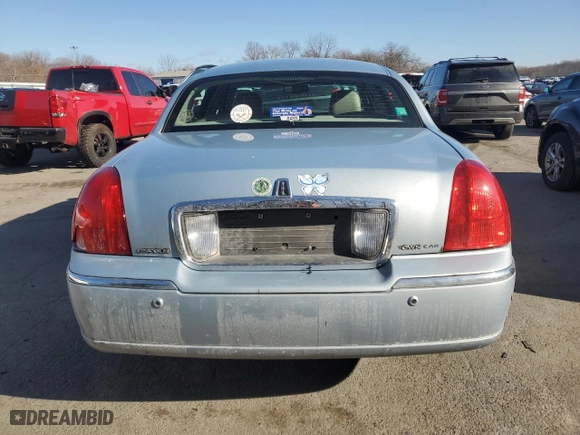 2005 Lincoln Town Car Signature with VIN 1LNHM81W65Y644390, listed as a Copart auction lot 88070925 with 184,453 mi miles and Salvage Title. Bid and sale history available at carsss.com. Image 6.