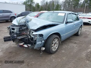 2005 Mercury Grand Marquis LS Premium z VIN 2MEFM75W85X669256, wystawiony jako IAAI lot #41966865 z przebiegiem 145 366 mil mil oraz . Historia ofert i sprzedaży dostępna na DreamBid. Obrazek 2.
