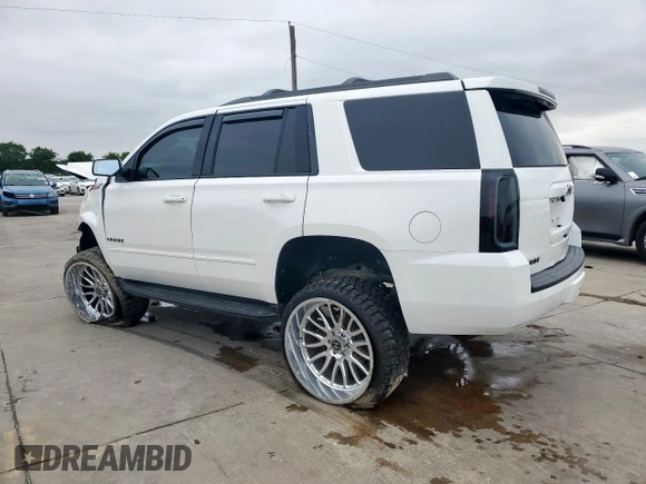 2018 Chevrolet Tahoe LT with VIN 1GNSKBKC1JR294115, listed as a Copart auction lot 59769515 with 81,523 mi miles and Salvage title. Bid and sale history available at DreamBid. Image 2.