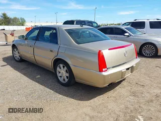 2006 Cadillac DTS w/1SC with VIN 1G6KD57Y86U209092, listed as a IAAI auction lot 41811298 with 156,676 mi miles. Bid and sale history available at carsss.com. Image 3.
