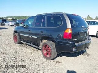 2002 GMC Envoy SLT z VIN 1GKDT13S522146661, wystawiony jako IAAI lot #40502587 z przebiegiem 274 877 mil mil oraz . Historia ofert i sprzedaży dostępna na DreamBid. Obrazek 3.
