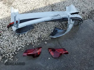 2022 Audi e-tron Premium z VIN WA1AAAGE0NB023860, wystawiony jako Copart lot #57395415 z przebiegiem 52 335 mil mil oraz Nie do naprawy. Historia ofert i sprzedaży dostępna na DreamBid. Obrazek 13.