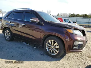 2011 Kia Sorento SX z VIN 5XYKW4A29BG156677, wystawiony jako Copart lot #42731225 z przebiegiem 245 581 mil mil oraz Czysty tytuł • Clean title. Historia ofert i sprzedaży dostępna na DreamBid. Obrazek 4.