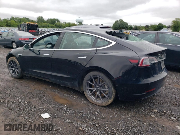2019 Tesla Model 3 Mid Range z VIN 5YJ3E1EA0KF394514, wystawiony jako Copart lot #58051215 z przebiegiem Nie podano mil oraz Szkody całkowita. Historia ofert i sprzedaży dostępna na DreamBid. Obrazek 2.