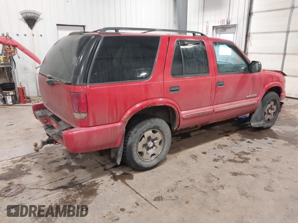 2004 Chevrolet Blazer LS z VIN 1GNDT13X34K157353, wystawiony jako IAAI lot #41089017 z przebiegiem 104 539 mil mil oraz . Historia ofert i sprzedaży dostępna na DreamBid. Obrazek 4.