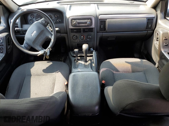 2004 Jeep Grand Cherokee Laredo z VIN 1J4GW48S24C217901, wystawiony jako Copart lot #60436675 z przebiegiem 263 837 mil mil oraz Szkoda całkowita • Salvage title. Historia ofert i sprzedaży dostępna na DreamBid. Obrazek 8.