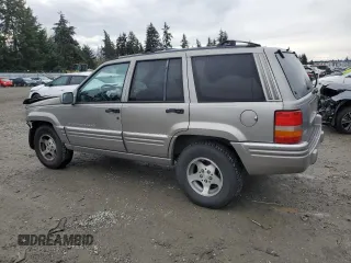 1997 Jeep Grand Cherokee Limited with VIN 1J4GZ78Y4VC693193, listed as a Copart auction lot 46327885 with 235,553 mi miles and Salvage Title. Bid and sale history available at carsss.com. Image 2.
