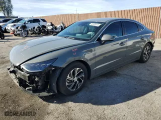 2023 Hyundai Sonata Hybrid Blue with VIN KMHL24JJ1PA061430, listed as a Copart auction lot 45979315 with 18,048 mi miles and Salvage Title. Bid and sale history available at carsss.com. Image 1.