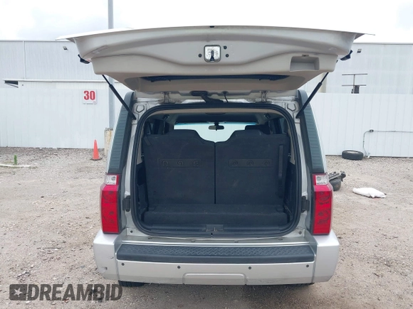 2010 Jeep Commander Sport with VIN 1J4RH4GKXAC157379, listed as a IAAI auction lot 42130174 with 193,337 mi miles and . Bid and sale history available at DreamBid. Image 17.