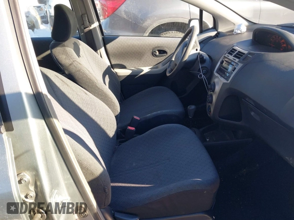 2010 Toyota Yaris with VIN JTDKT4K32A5293998, listed as a IAAI auction lot 41635631 with 221,414 mi miles. Bid and sale history available at carsss.com. Image 5.