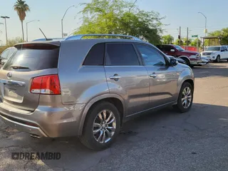 2011 Kia Sorento SX with VIN 5XYKW4A23BG164399, listed as a Copart auction lot 62526505 with 196,401 mi miles and Clean title. Bid and sale history available at DreamBid. Image 4.