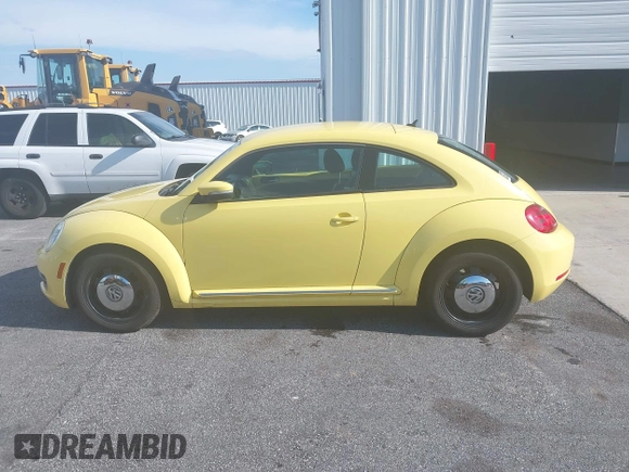 2013 Volkswagen Beetle 2.5L with VIN 3VWHX7AT7DM613197, listed as a IAAI auction lot 41298890 with 130,219 mi miles and . Bid and sale history available at DreamBid. Image 14.