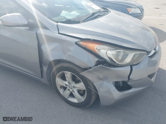 2013 Hyundai Elantra GLS PZEV with VIN KMHDH4AE9DU680860, listed as a IAAI auction lot 41068349 with 74,687 mi miles. Bid and sale history available at carsss.com. Image 6.