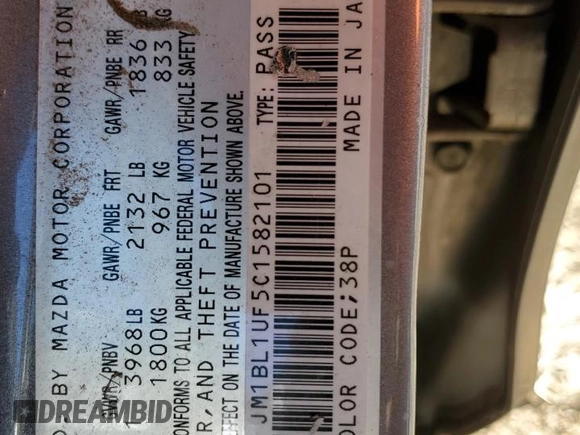 2012 Mazda 3 i Sport with VIN JM1BL1UF5C1582101, listed as a Copart auction lot 53322825 with 144,216 mi miles and Salvage Title. Bid and sale history available at DreamBid. Image 12.