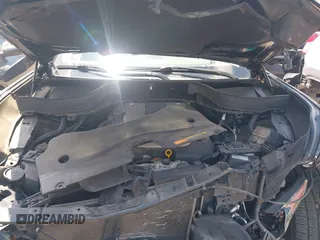 2015 Infiniti QX70 z VIN JN8CS1MW9FM483358, wystawiony jako IAAI lot #42194570 z przebiegiem 86 168 mil mil oraz . Historia ofert i sprzedaży dostępna na DreamBid. Obrazek 10.