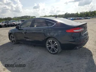 2019 Ford Fusion Titanium with VIN 3FA6P0D97KR184134, listed as a Copart auction lot 50913245 with 128,888 mi miles and Clean Title. Bid and sale history available at carsss.com. Image 2.
