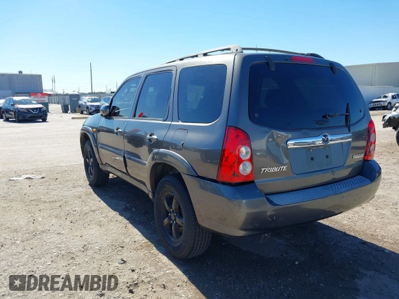 2005 Mazda Tribute S with VIN 4F2CZ06175KM49643, listed as a IAAI auction lot 41397843 with 185,088 mi miles and . Bid and sale history available at carsss.com. Image 3.