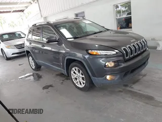 2016 Jeep Cherokee Latitude z VIN 1C4PJLCB6GW247945, wystawiony jako IAAI lot #42318476 z przebiegiem 154 350 mil mil oraz . Historia ofert i sprzedaży dostępna na DreamBid. Obrazek 1.