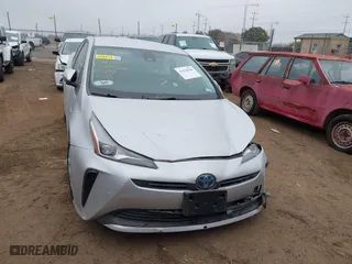 2022 Toyota Prius L Eco with VIN JTDKAMFU9N3185999, listed as a IAAI auction lot 41428106 with 50,798 mi miles. Bid and sale history available at carsss.com. Image 12.