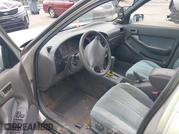 1993 Toyota Camry LE z VIN 4T1SK12E0PU290398, wystawiony jako IAAI lot #42032664 z przebiegiem 264 922 mil mil oraz . Historia ofert i sprzedaży dostępna na DreamBid. Obrazek 5.