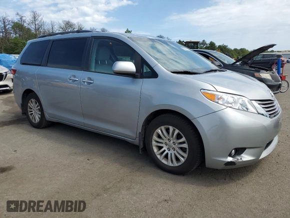 2015 Toyota Sienna XLE with VIN 5TDYK3DC2FS529006, listed as a Copart auction lot 62750995 with 142,990 mi miles and Salvage title. Bid and sale history available at DreamBid. Image 4.