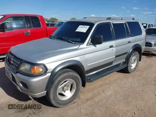 2001 Mitsubishi Montero ES z VIN JA4LS21HX1P041052, wystawiony jako IAAI lot #42084599 z przebiegiem 239 095 mil mil oraz . Historia ofert i sprzedaży dostępna na DreamBid. Obrazek 2.