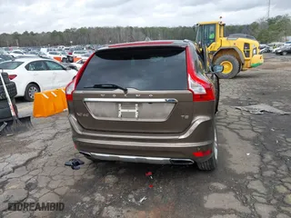 2015 Volvo XC60 T5 Drive-E Premier with VIN YV440MDK8F2681703, listed as a IAAI auction lot 41730228 with 112,738 mi miles. Bid and sale history available at carsss.com. Image 16.