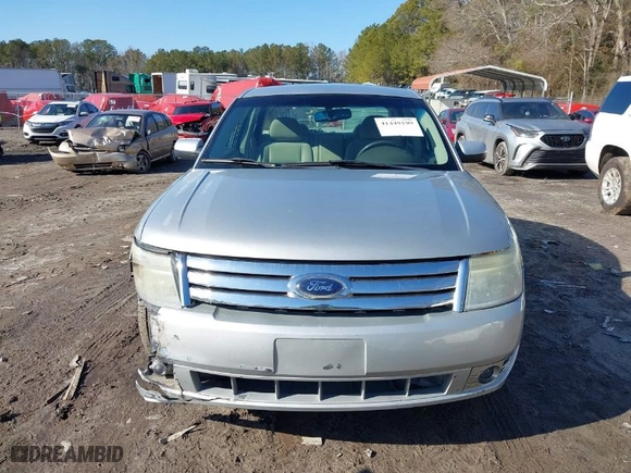 2009 Ford Taurus SE with VIN 1FAHP23WX9G120232, listed as a IAAI auction lot 41449199 with 162694 miles. Bid and sale history available at carsss.com. Image 12.