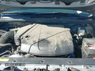 2015 Toyota Tacoma with VIN 3TMLU4EN1FM197831, listed as a IAAI auction lot 43233901 with 123,905 mi miles and . Bid and sale history available at DreamBid. Image 19.