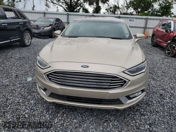 2017 Ford Fusion Hybrid Titanium with VIN 3FA6P0RU5HR359714, listed as a Copart auction lot 59156975 with 84,220 mi miles and Salvage title. Bid and sale history available at DreamBid. Image 5.
